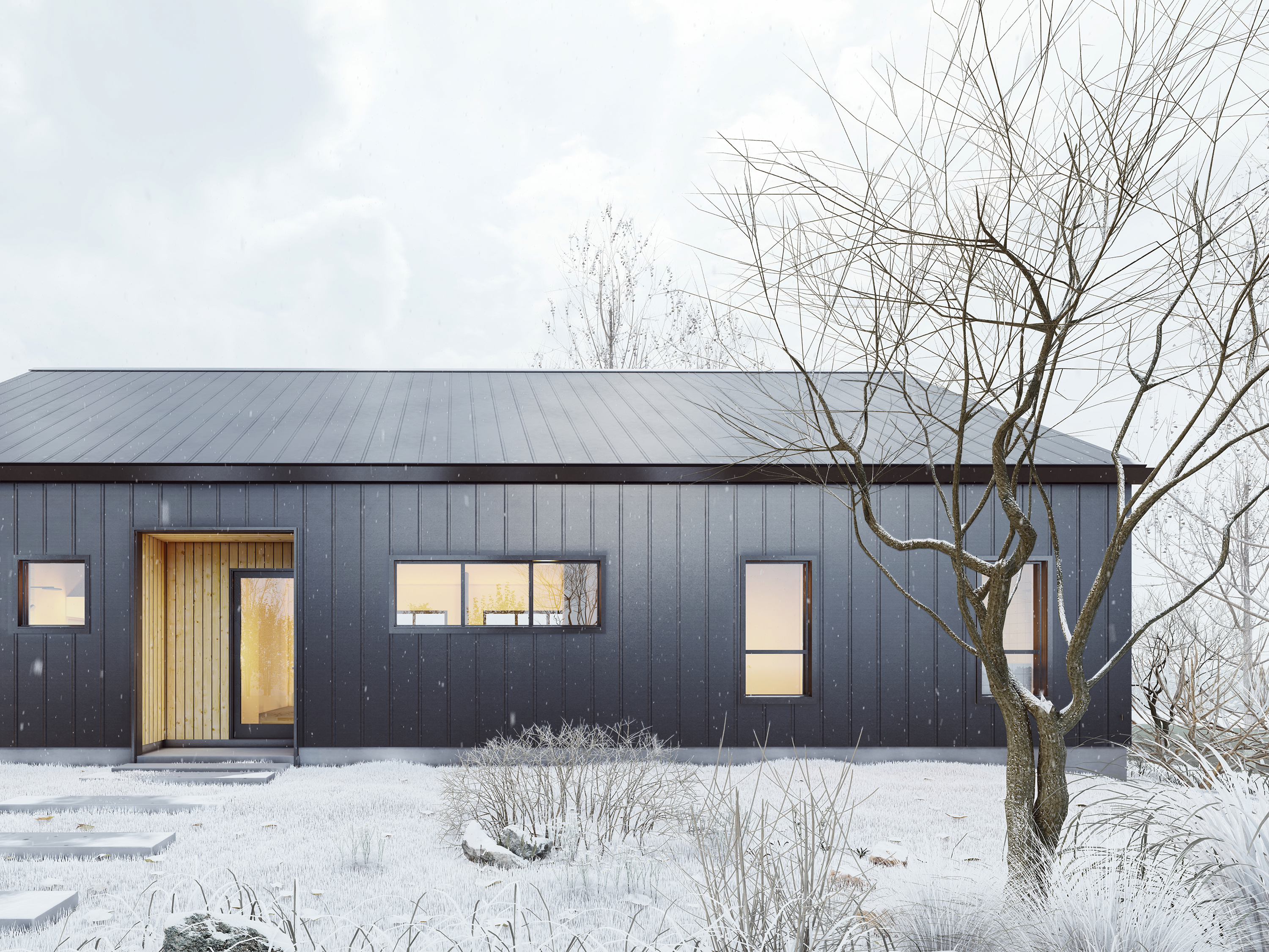 2-bedroom modern cabin house plan front elevation with wood entry accent, standing seam metal roof and siding, and warm interior lighting in winter