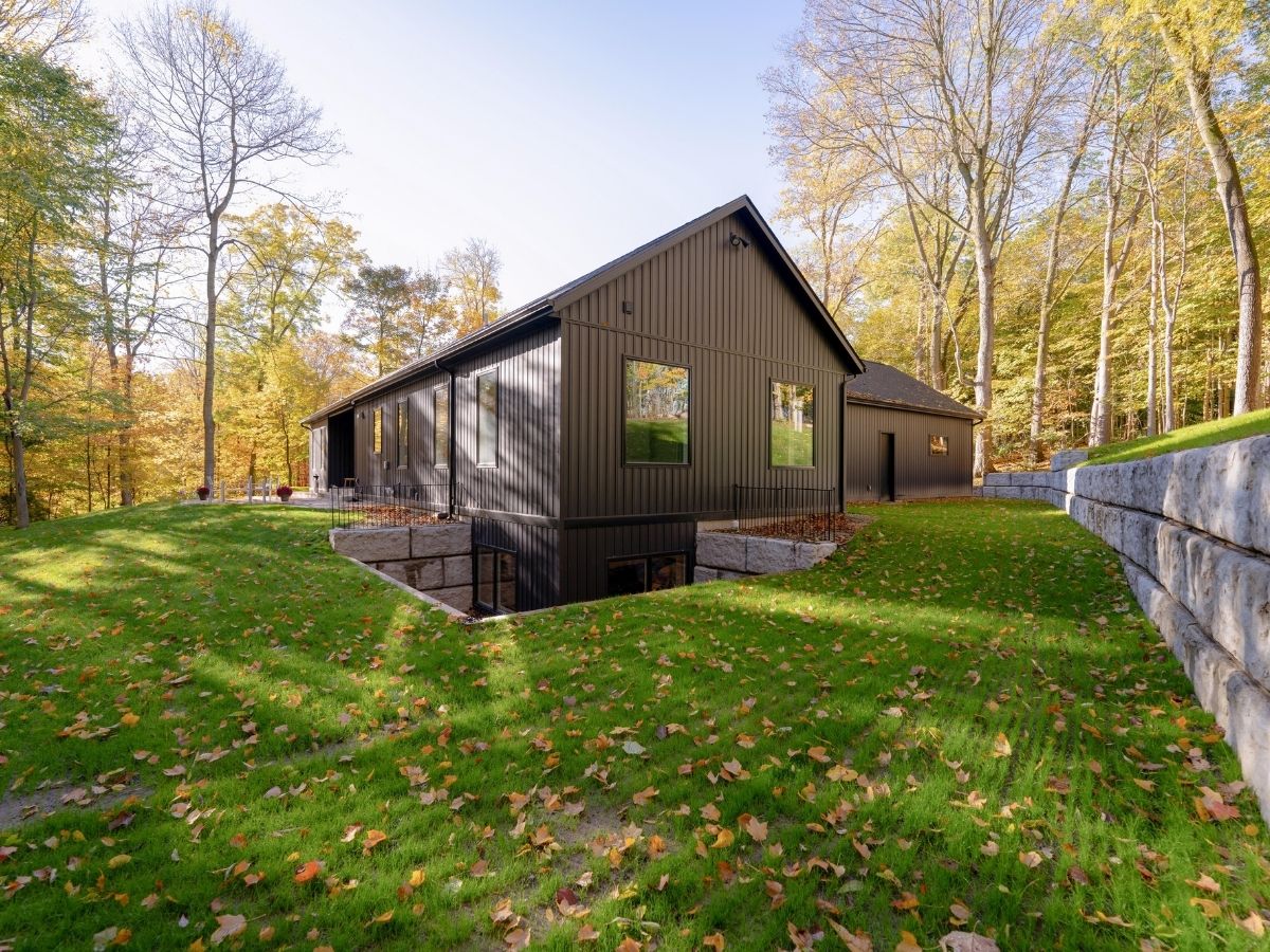 Architect-designed modern farmhouse exterior — understanding construction cost estimates before you build