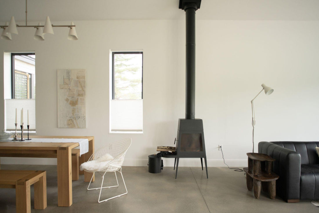 polished concrete floor with thermal mass and hydronic radiant heating at Cedar Residence Maine farmhouse