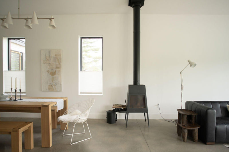 Thermal mass concrete floor with radiant floor heating in a modern living room