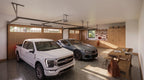 3 car garage apartment plans — garage interior with truck and car parked, workbench and built-in storage cabinets in the third bay