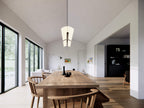 Modern dogtrot house exterior — natural wood detailing and standing seam metal roof