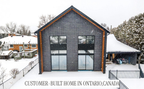 Customer-built Nordic barndominium in Collingwood, Ontario — real DesignwithFrank family home in a snowy suburban setting