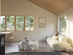Garage apartment interior — open living and dining area with linear kitchenette and large window