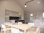 Mini barndominium interior — island kitchen open to the living and dining area
