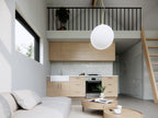 Micro cabin ADU interior — bedroom with French doors and natural light