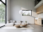 Micro cabin ADU interior — vaulted living area with large windows and natural light