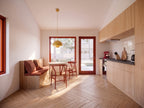 Accessible kitchen in the 792 sqft ADA ADU house plan with universal design counters and open approach for a wheelchair user