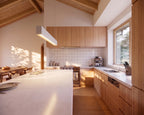 Modern kitchen with island and built-in wall cabinet in minimalist house plan