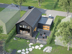 Aerial view of 3 bedroom modern barn house plan — 2-car garage, backyard deck and lakeside outdoor kitchen