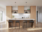 Modern barn house plan kitchen — wood cabinetry, large island with bar seating and subway tile backsplash
