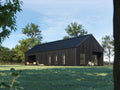 Contemporary black barn home with charred wood vertical siding and black pitched metal roof, daytime side elevation showing covered porch area, narrow windows, and recessed gable-end entrance in green meadow setting