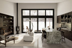 Open-concept living and dining area with green marble kitchen island, wood-burning stove, built-in shelving, large picture window, and black-trim sliding glass door with winter forest view – Design with Frank