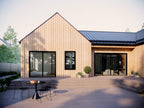 Southern modern farmhouse house plan rear patio with wide wood deck, natural wood vertical siding, black-frame sliding glass doors and gabled metal roof