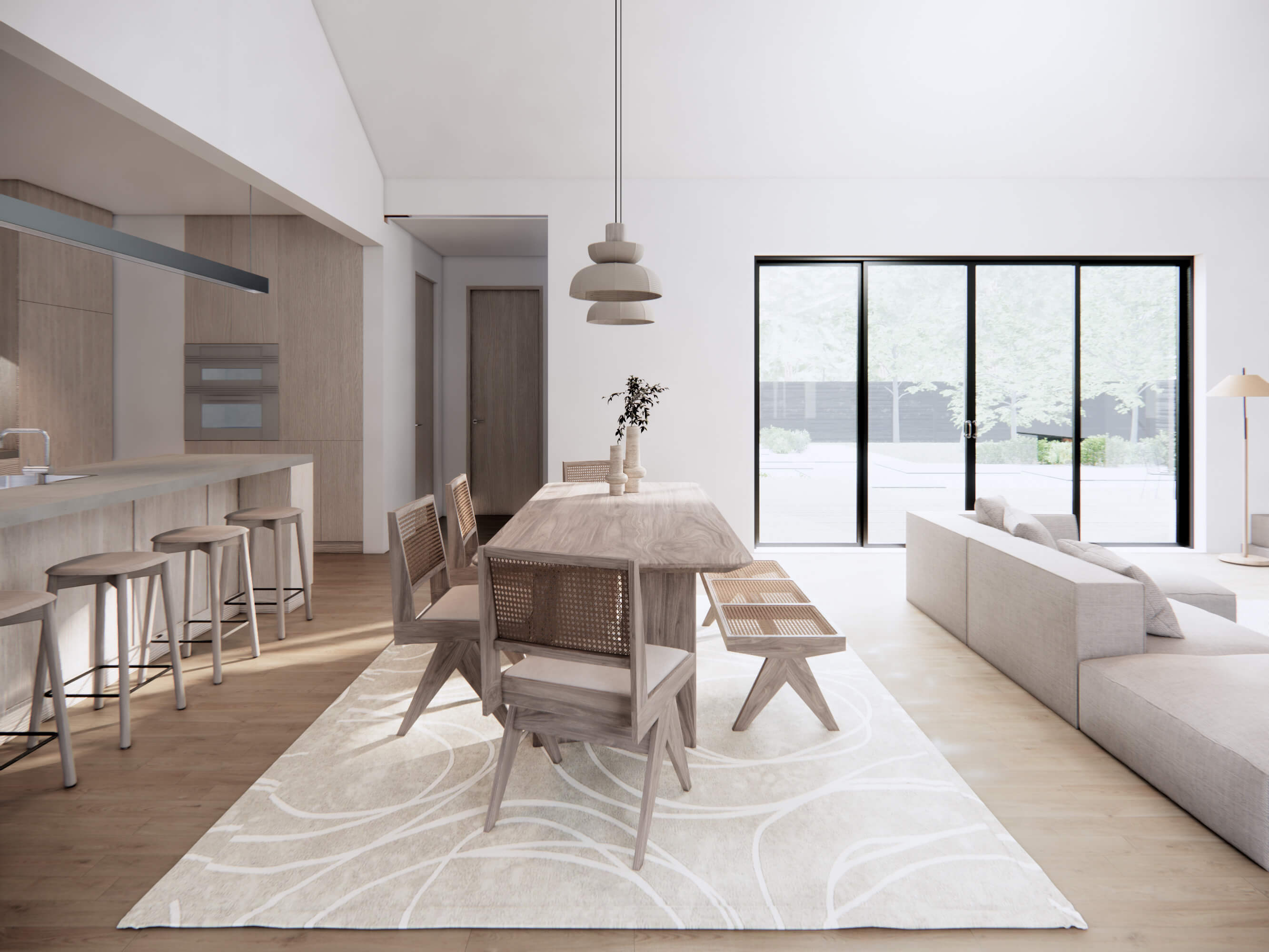 Design with Frank's 3BD Southern Serenity Home. Open Plan Layout interior of common areas. Wood Flooring and white walls and vaulted ceiling