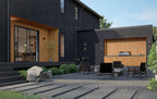 Barndominium backyard — lakeside outdoor kitchen, lounge seating and black wood cladding