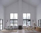 Cabin house plan with loft exterior in daylight — small two-story home with tall gable windows