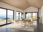 Modern ranch house plan interior — open dining area beneath double-height windows