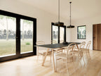 Modern loft house plan kitchen — L-shaped layout with wood cabinets and large windows over the sink
