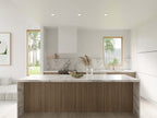 Barndominium kitchen interior — L-shaped layout with island, stone countertops and neutral palette