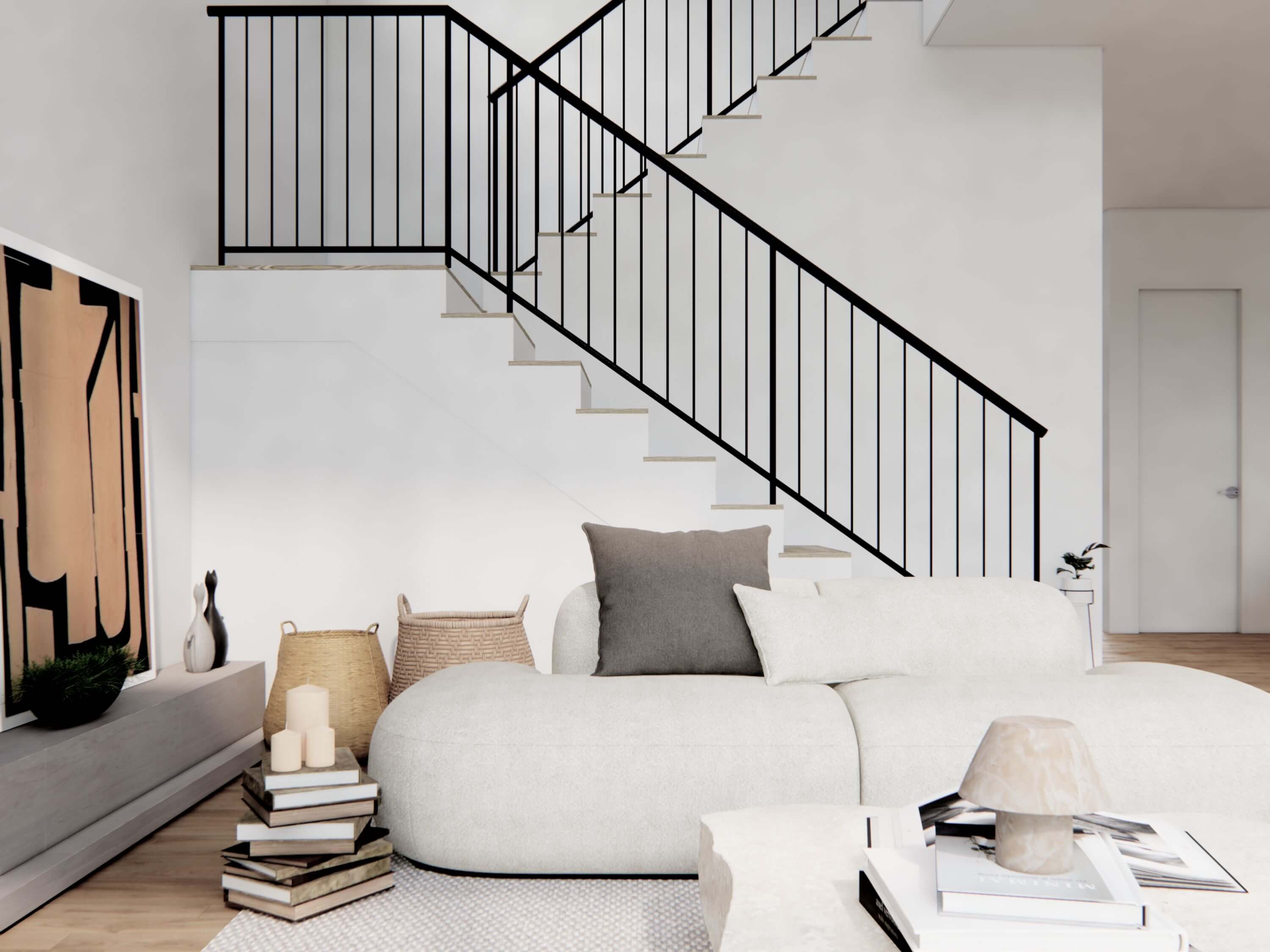 Nordic barndominium living room with double-height vaulted ceiling, black iron staircase and railing, neutral sectional sofa and loft overlook